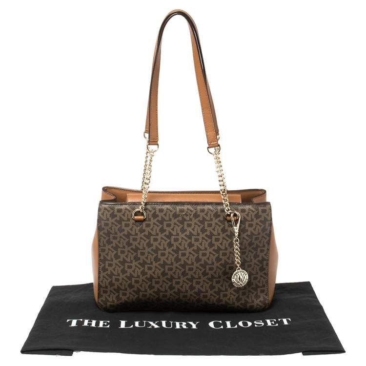 مملوكة مسبقًا Dkny Brown Monogram Coated Canvas And Leather Medium Bryant Park Shopper Tote