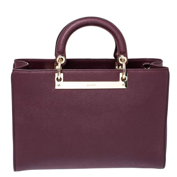 Pre Owned Dkny Burgundy Leather Logo Plague Zip Tote
