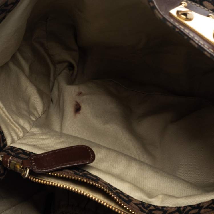 Pre Owned Dkny Brown/Black Signature Canvas and Leather Studded Satchel
