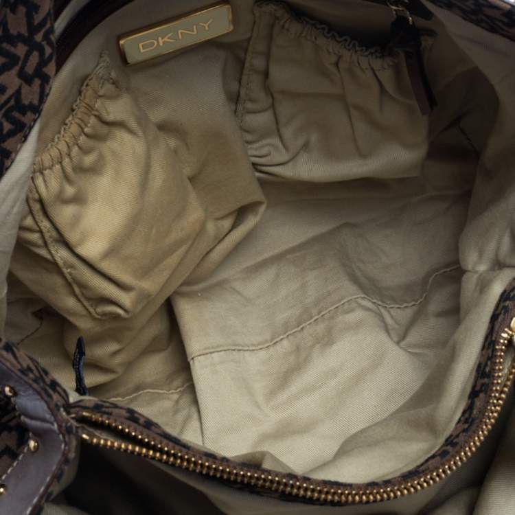 Pre Owned Dkny Brown/Black Signature Canvas and Leather Studded Satchel