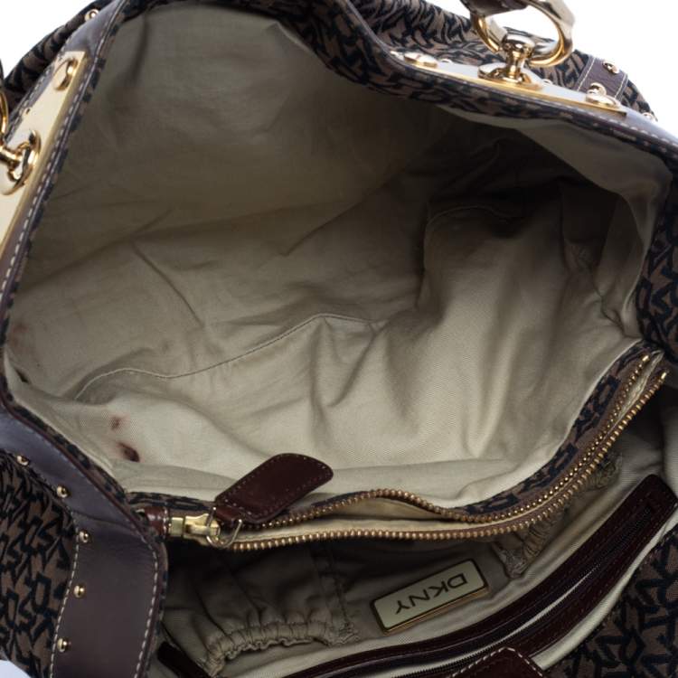 Pre Owned Dkny Brown/Black Signature Canvas and Leather Studded Satchel