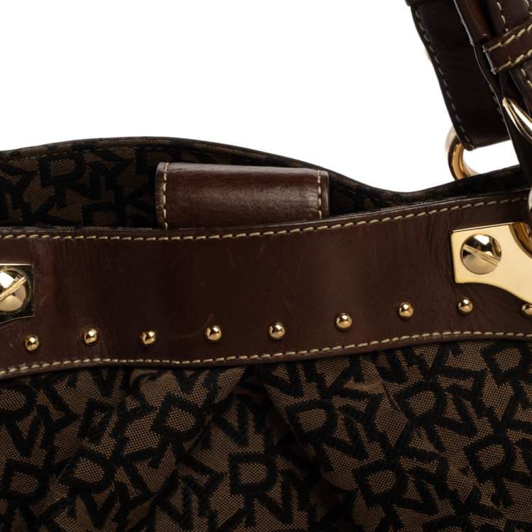 Pre Owned Dkny Brown/Black Signature Canvas and Leather Studded Satchel