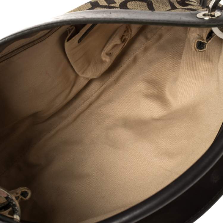 Pre Owned Dkny Dark Brown Signature Canvas and Leather Ring Handle Hobo