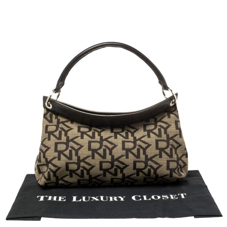 Pre Owned Dkny Dark Brown Signature Canvas and Leather Ring Handle Hobo