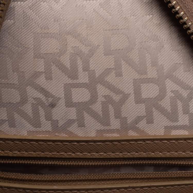 Pre Owned DKNY Beige/Brown Signature Coated Canvas and Leather Casey Backpack