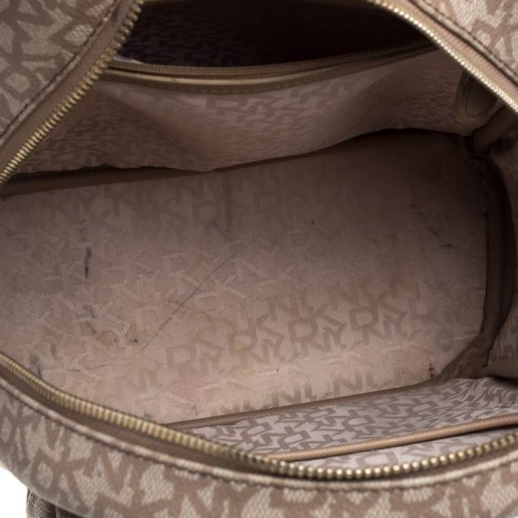 Pre Owned DKNY Beige/Brown Signature Coated Canvas and Leather Casey Backpack