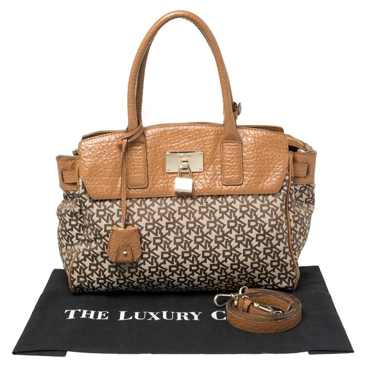 Pre Owned Dkny Beige/Brown Signature Canvas and Leather Heritage Lock Tote