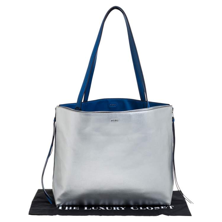 Pre Owned Dkny Silver/Blue Leather Side Zip Reversible Tote