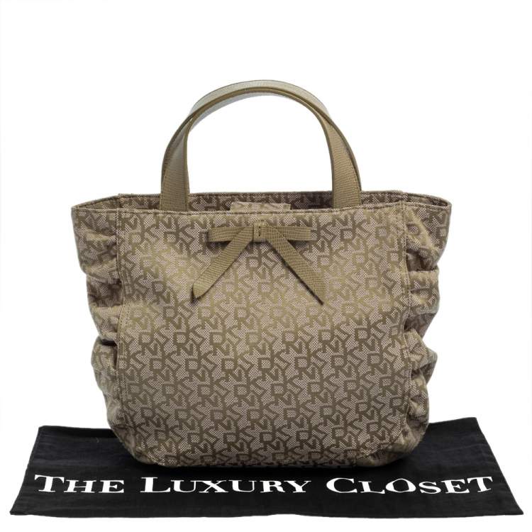 Pre Owned Dkny Pale Green/Beige Monogram Canvas and Lizard Embossed Bow Tote