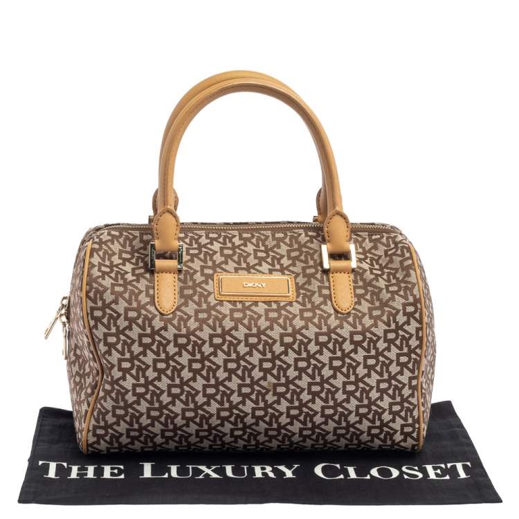 Pre Owned DKNY Beige/Tan Signature Canvas and Leather Boston Bag