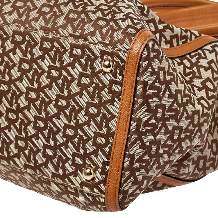 Pre Owned Dkny Beige/Tan Signature Canvas and Leather Tote 