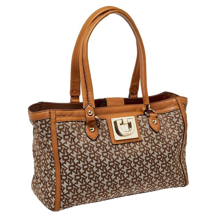 Pre Owned Dkny Beige/Tan Signature Canvas and Leather Tote 