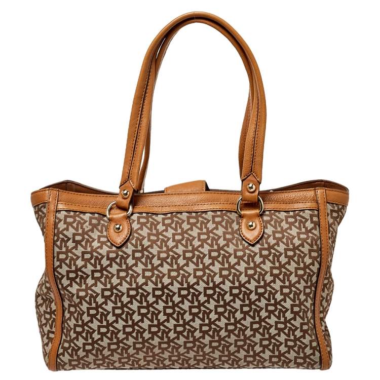 Pre Owned Dkny Beige/Tan Signature Canvas and Leather Tote 