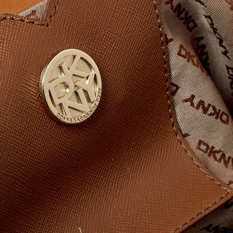 Pre Owned Dkny Beige/Tan Signature Canvas and Leather Tote 