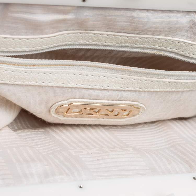Pre Owned DKNY Beige/Orange Signature Canvas and Leather Kisslock Frame Clutch