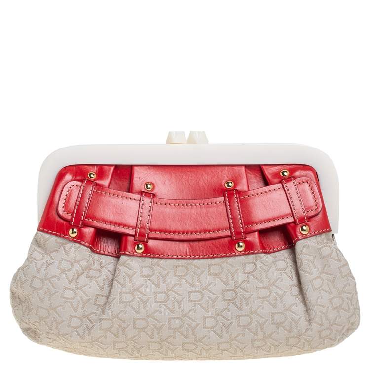 Pre Owned DKNY Beige/Orange Signature Canvas and Leather Kisslock Frame Clutch