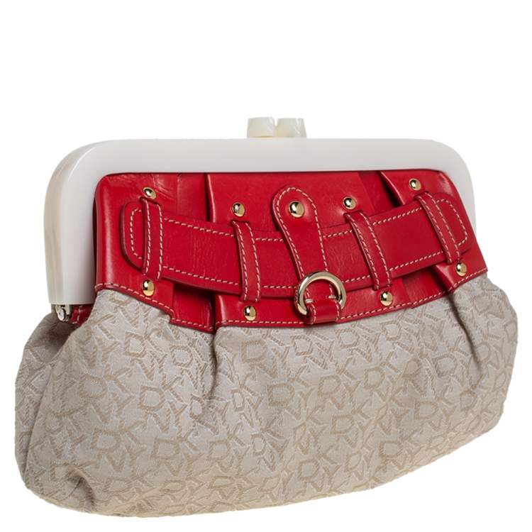 Pre Owned DKNY Beige/Orange Signature Canvas and Leather Kisslock Frame Clutch