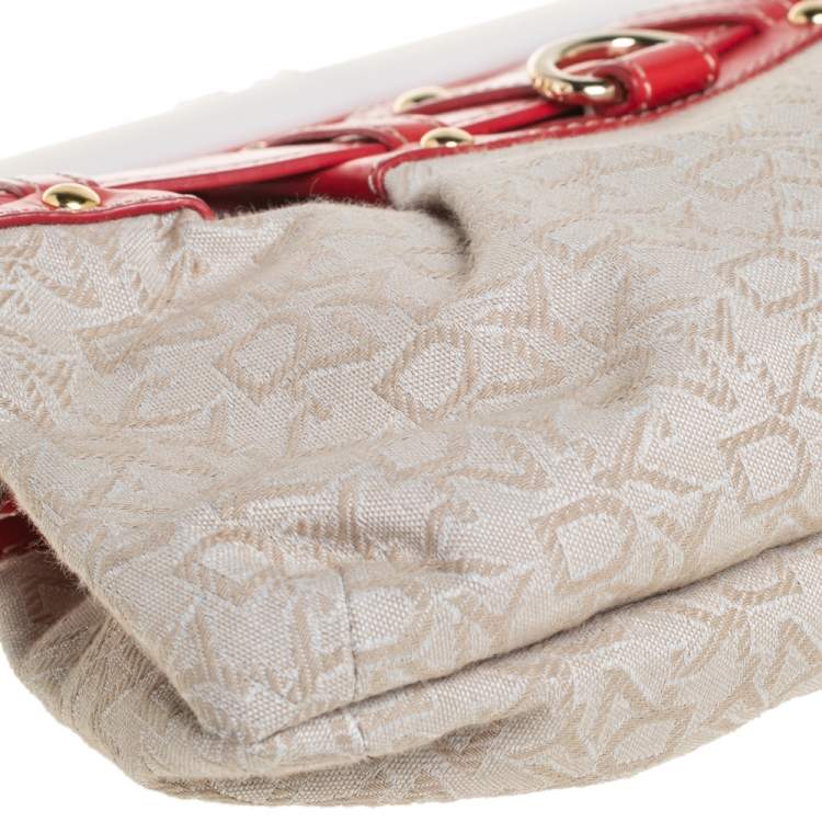 Pre Owned DKNY Beige/Orange Signature Canvas and Leather Kisslock Frame Clutch