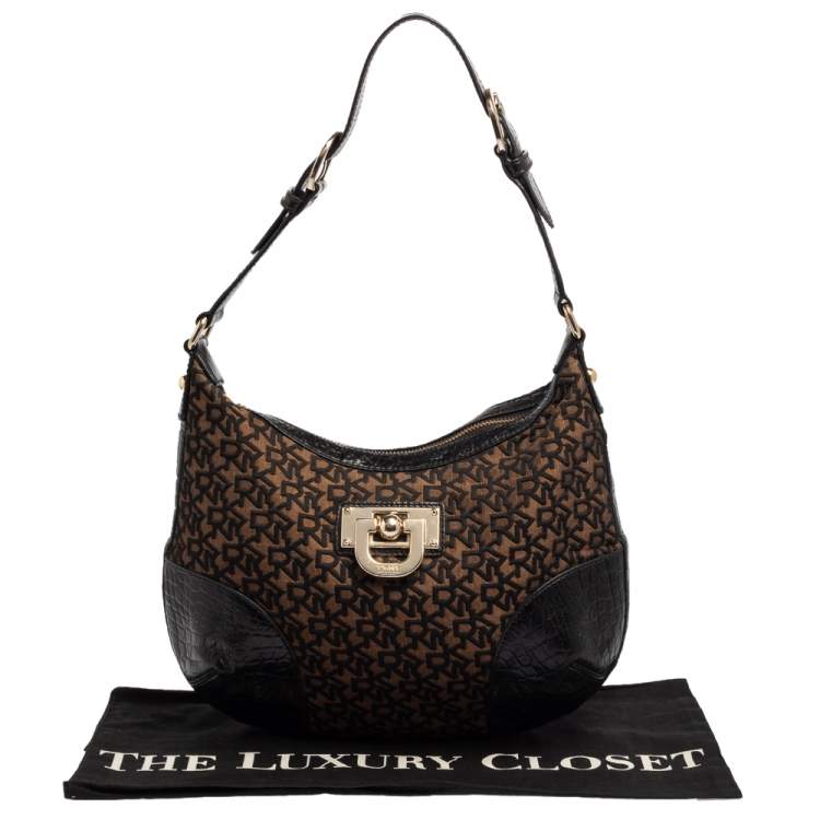 Pre Owned Dkny Brown/Black Signature Canvas and Leather Hobo