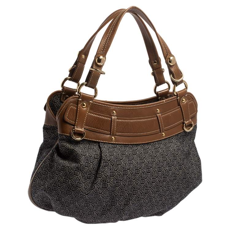 Pre Owned Dkny Navy Blue/Brown Monogram Canvas and Leather Hobo
