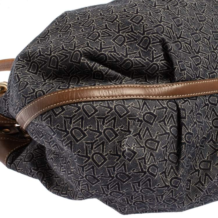 Pre Owned Dkny Navy Blue/Brown Monogram Canvas and Leather Hobo