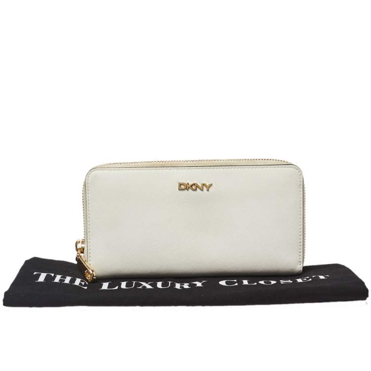 Pre Owned Dkny White Saffiano Leather Zip Around Continental Wallet 