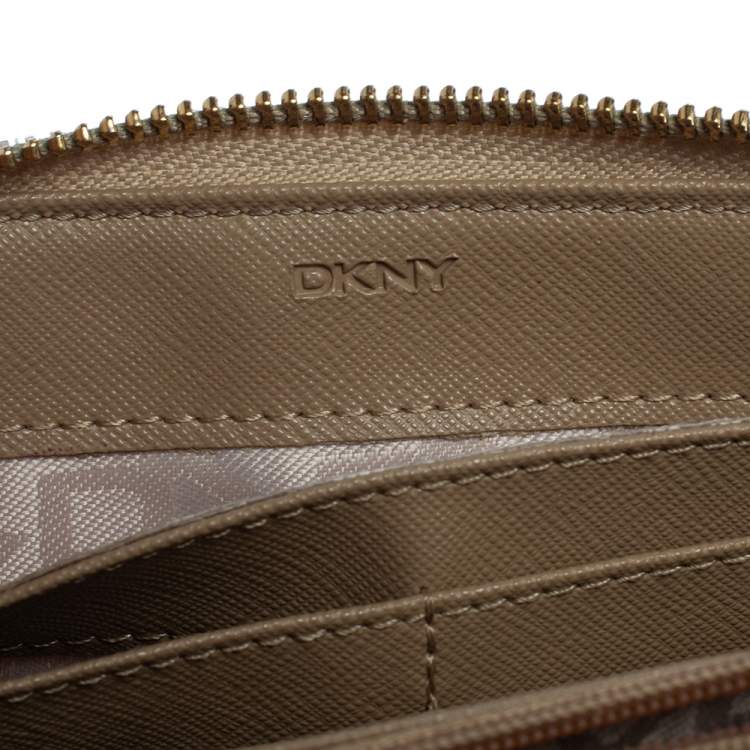 Pre Owned DKNY Beige Signature Coated Canvas and Leather Zip Around Wallet