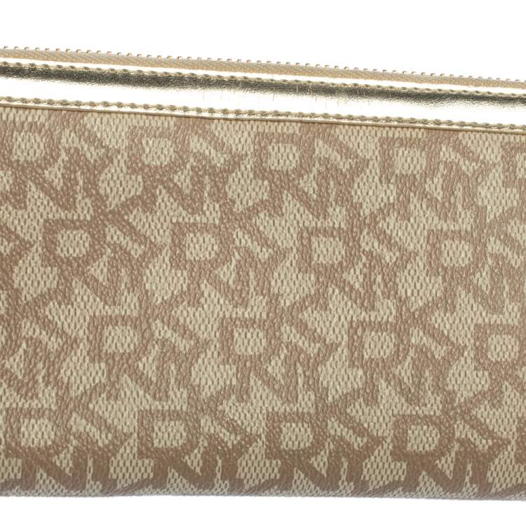 Pre Owned DKNY Beige Signature Coated Canvas and Leather Zip Around Wallet