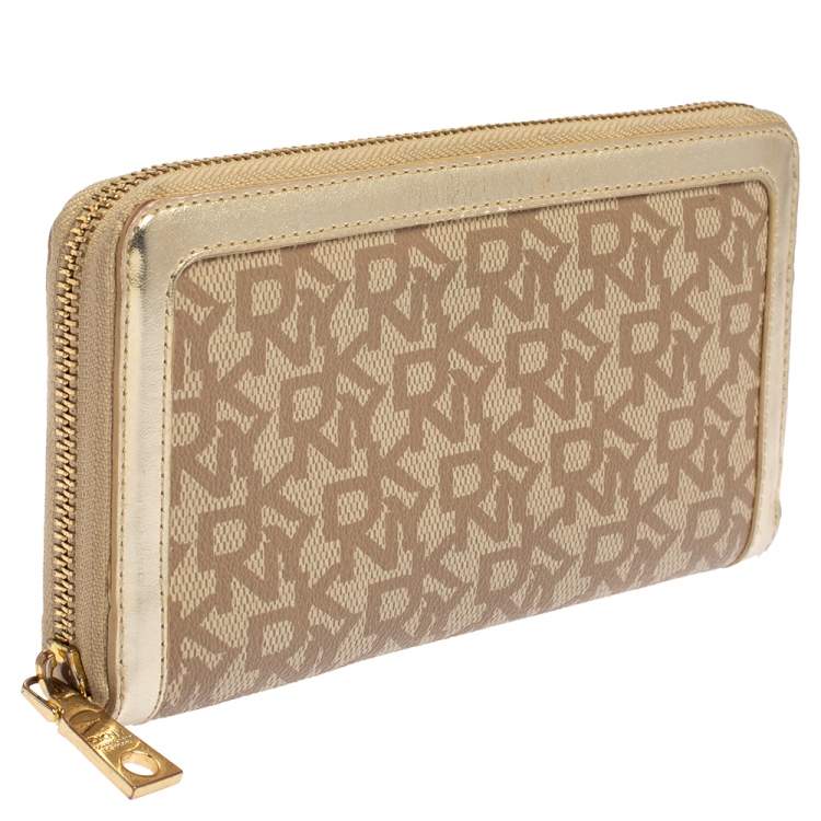 Pre Owned DKNY Beige Signature Coated Canvas and Leather Zip Around Wallet