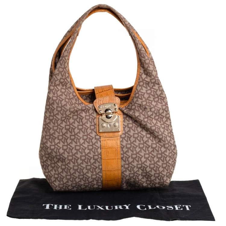 Pre Owned Dkny Beige/Brown Signature Canvas and Croc Embossed Leather Push Lock Hobo 