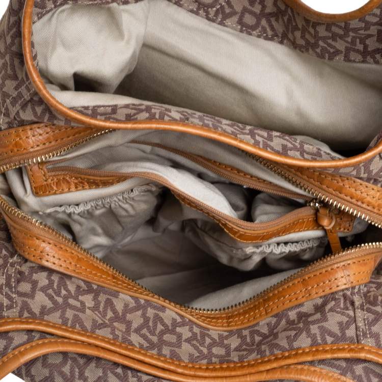 Pre Owned Dkny Beige/Brown Signature Canvas and Croc Embossed Leather Push Lock Hobo 