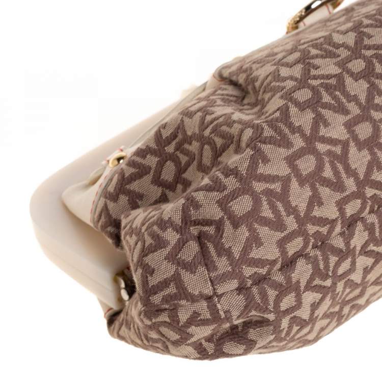 Pre Owned DKNY Beige/Brown Signature Canvas and Leather Kisslock Frame Clutch