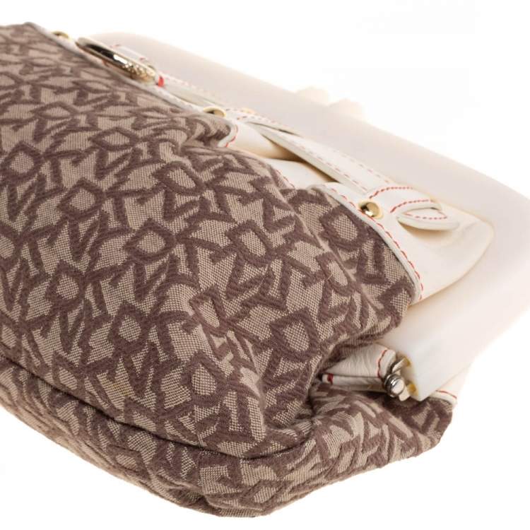 Pre Owned DKNY Beige/Brown Signature Canvas and Leather Kisslock Frame Clutch