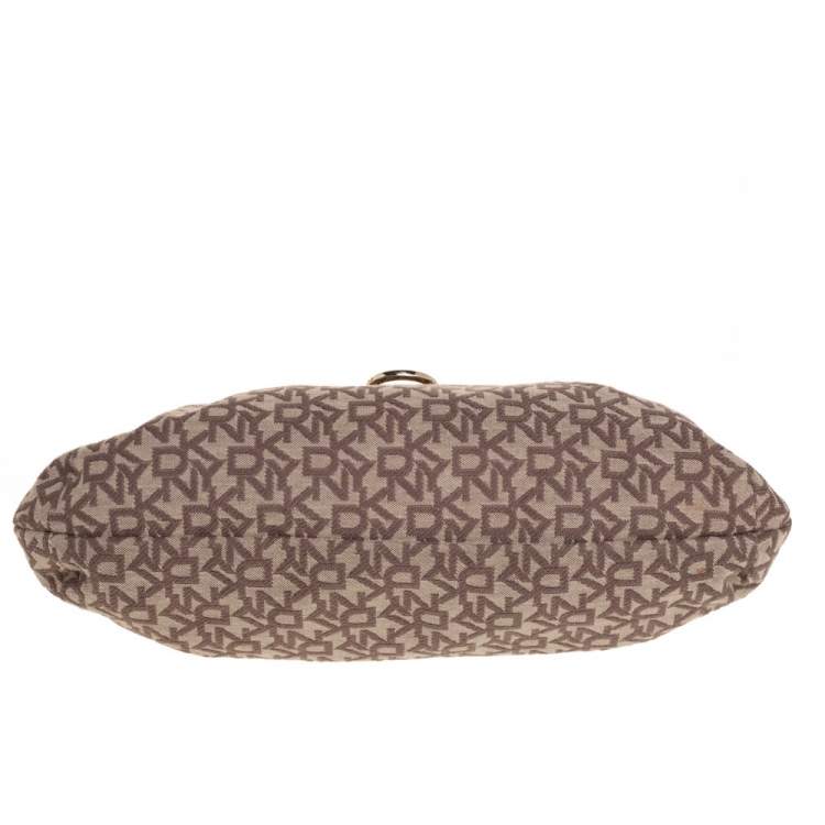 Pre Owned DKNY Beige/Brown Signature Canvas and Leather Kisslock Frame Clutch