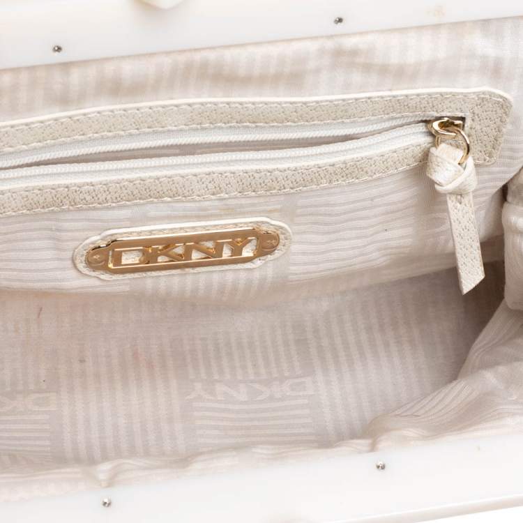 Pre Owned DKNY Beige/Brown Signature Canvas and Leather Kisslock Frame Clutch