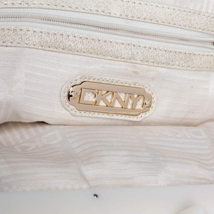 Pre Owned DKNY Beige/Brown Signature Canvas and Leather Kisslock Frame Clutch