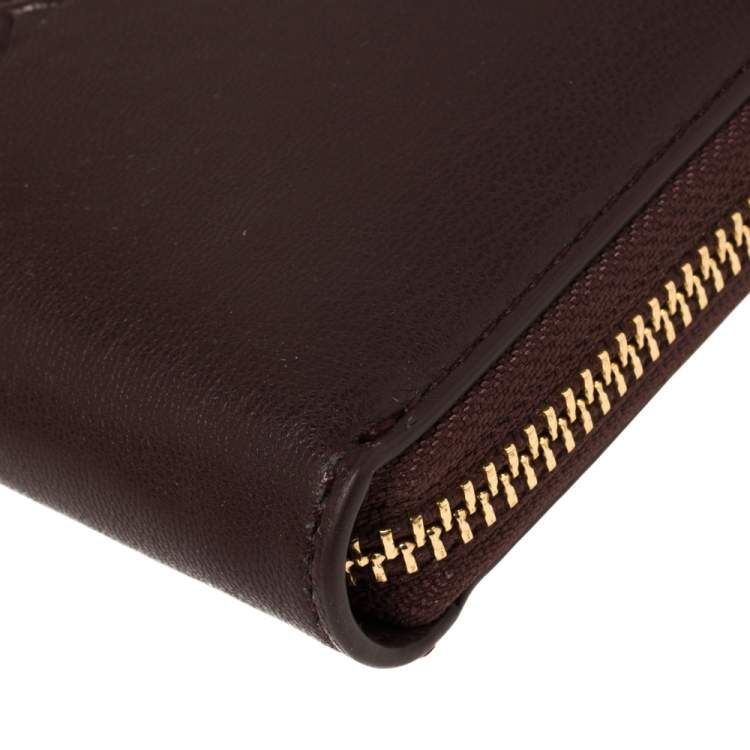 Pre Owned Dkny Burgundy Faux Leather Zip Around Wallet