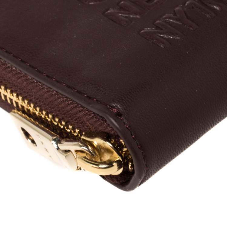 Pre Owned Dkny Burgundy Faux Leather Zip Around Wallet