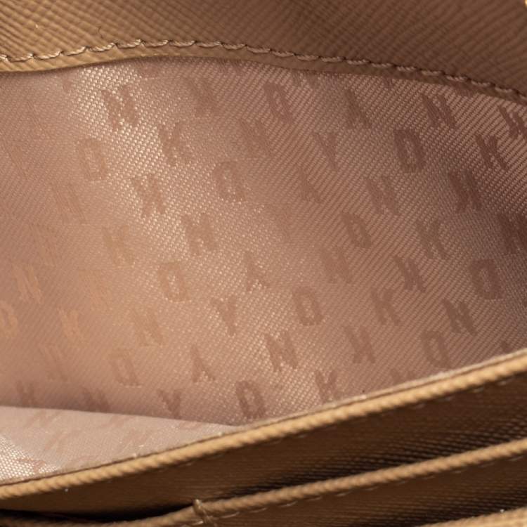 Pre Owned Dkny Metallic Beige Leather Zip Around Wallet