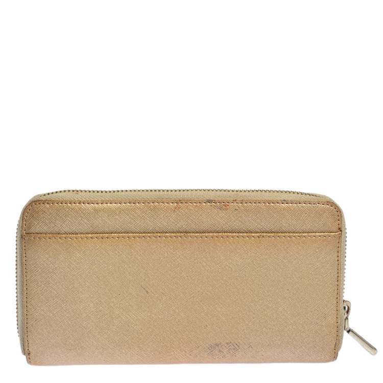 Pre Owned Dkny Metallic Beige Leather Zip Around Wallet