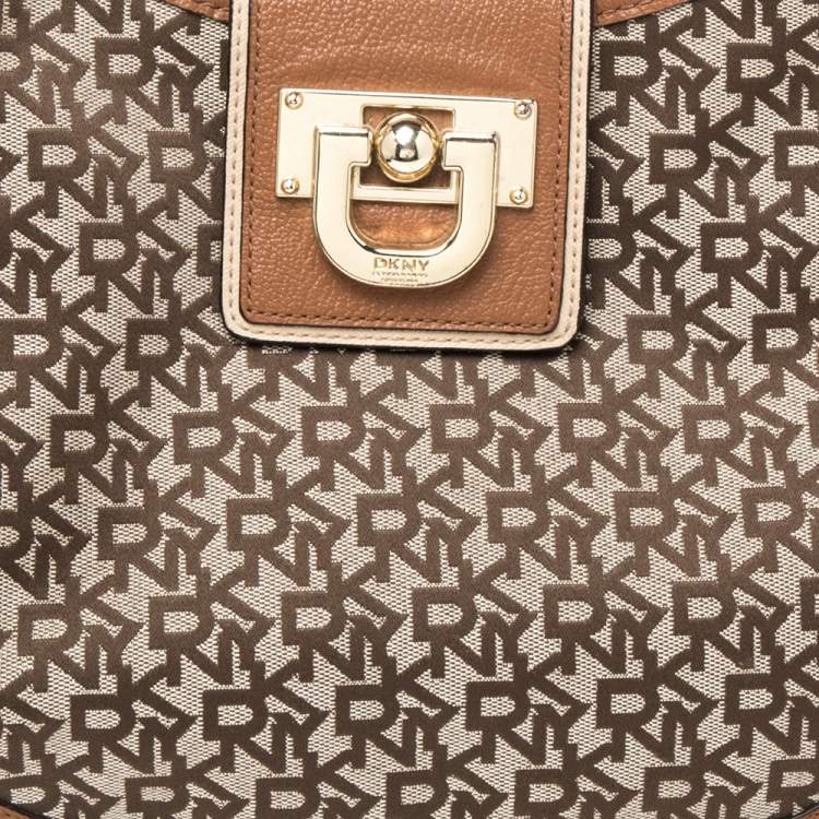 Pre Owned DKNY Brown Signature Canvas and Leather Trim Buckle Hobo