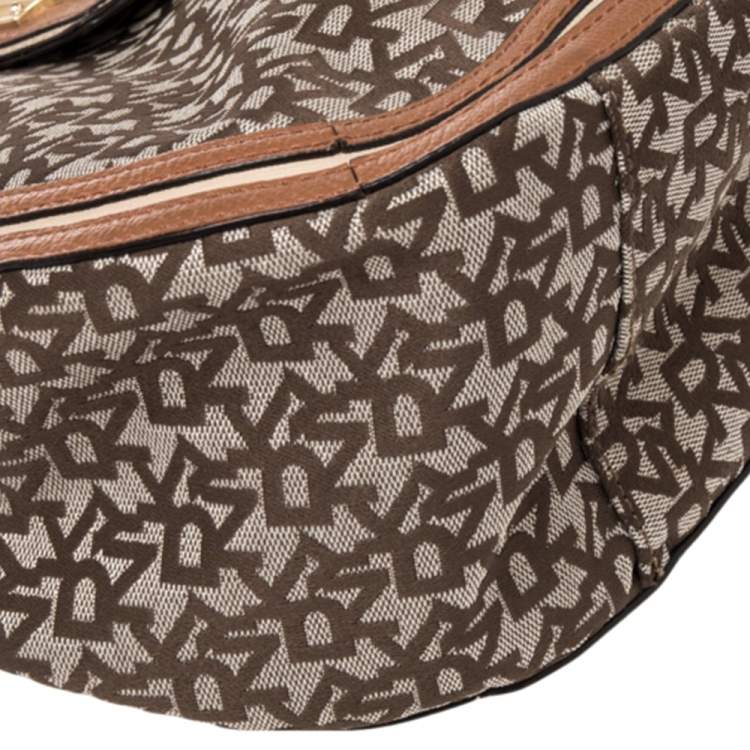 Pre Owned DKNY Brown Signature Canvas and Leather Trim Buckle Hobo