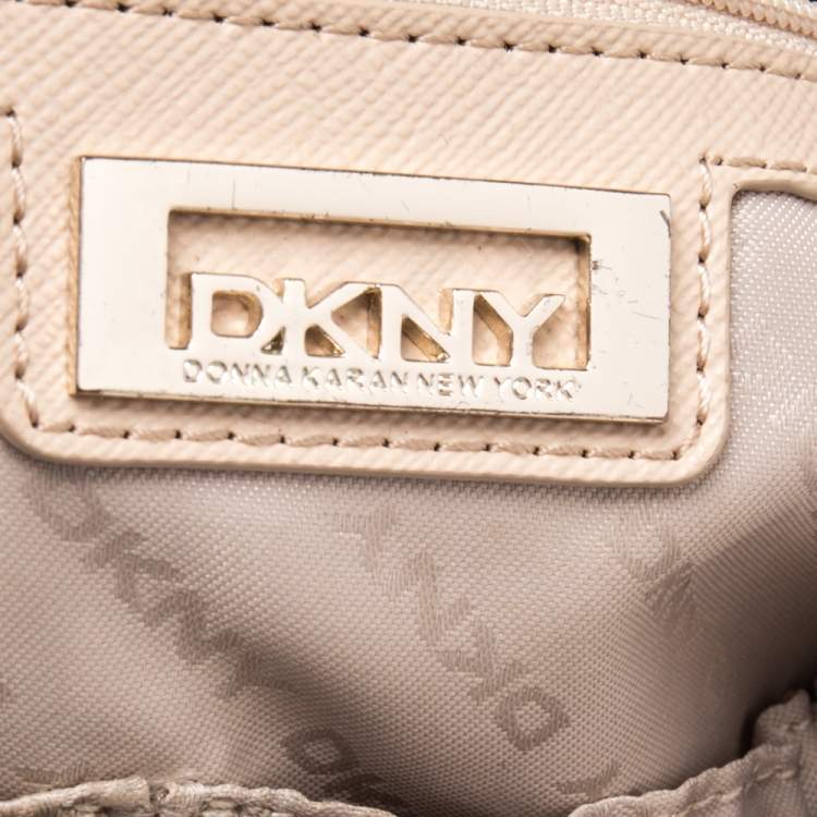 Pre Owned DKNY Brown Signature Canvas and Leather Trim Buckle Hobo