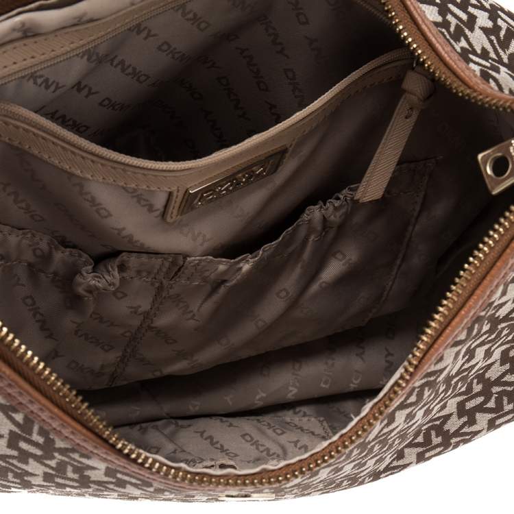 Pre Owned DKNY Brown Signature Canvas and Leather Trim Buckle Hobo