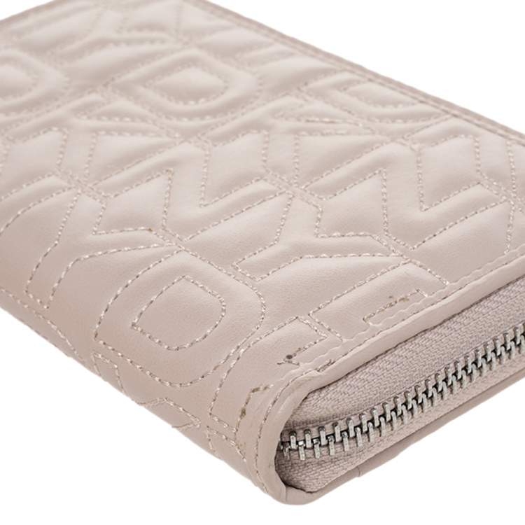 Pre Owned Dkny Pink Quilted Leather Zip Around Compact Wallet