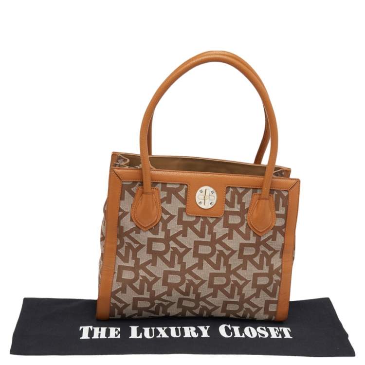 Pre Owned DKNY Beige/Tan Signature Canvas and Leather Tote