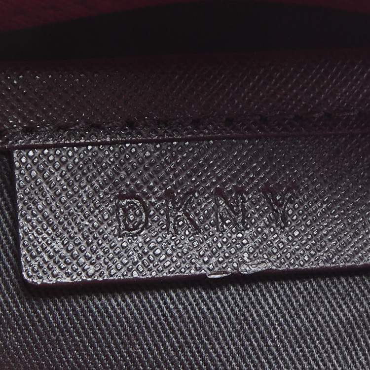 Pre Owned DKNY Fuchsia Leather Small Bryant Park Pocket Crossbody Bag