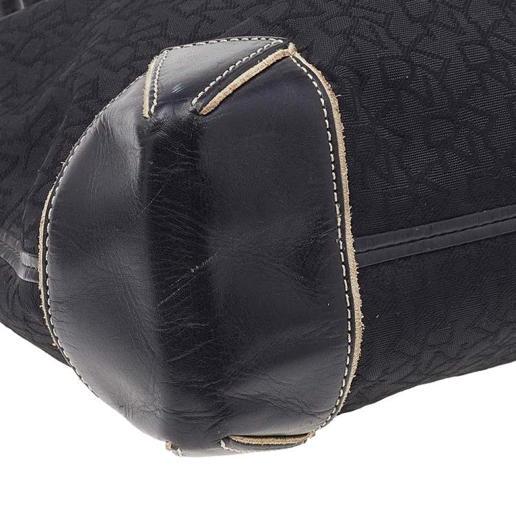 Pre Owned Dkny Monogram Canvas And Leather Tote