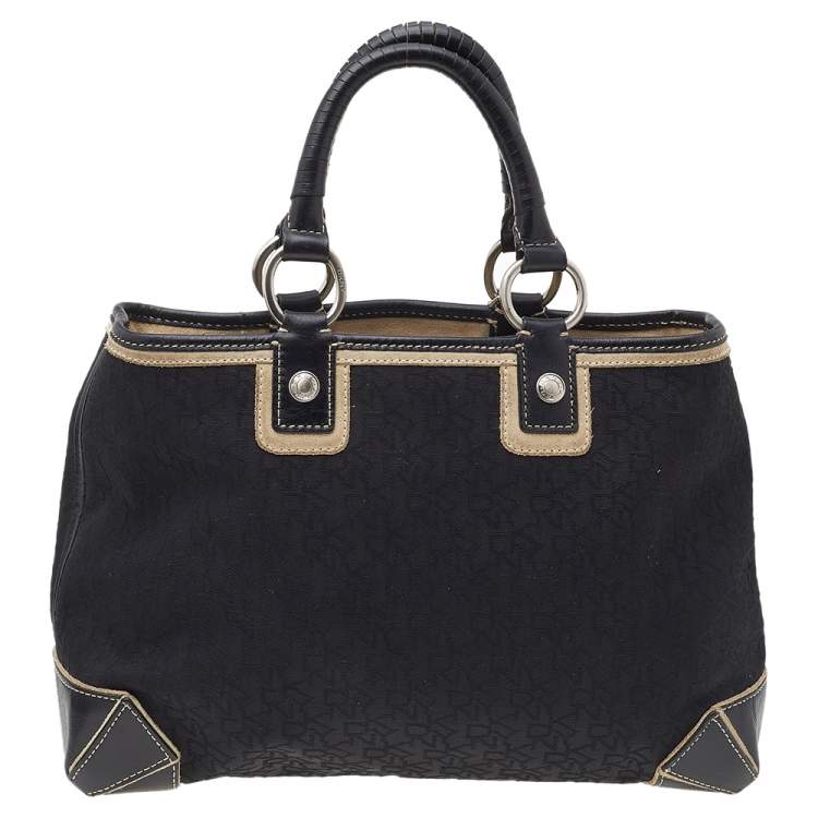 Pre Owned Dkny Monogram Canvas And Leather Tote