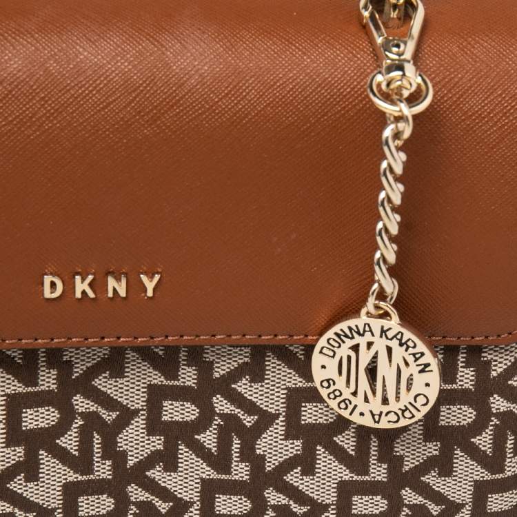 Pre Owned DKNY Brown/Beige Signature Canvas and Leather Noho Flap Shoulder Bag